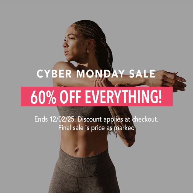 An African American woman in HYLETE athletic apparel, stretching her arms in a Cyber Monday Sale banner.