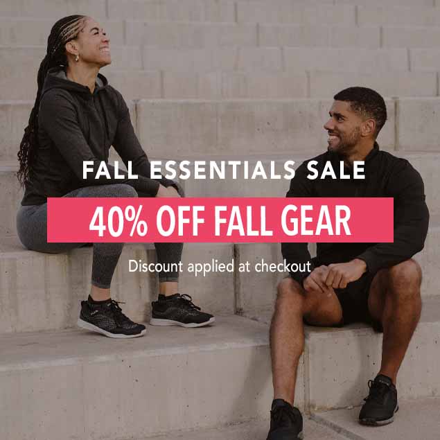 A smiling man and woman wearing athletic Hylete apparel sit on concrete steps. A pink banner overlay reads: 