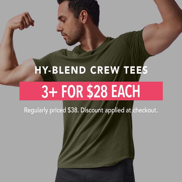 Man with short dark hair and a muscular build wearing an olive green HY-Blend Crew Tee, flexing his bicep. Text overlaid on the image reads: "HY-BLEND CREW TEES 3+ FOR $28 EACH. Regularly priced $38. Discount applied at checkout."