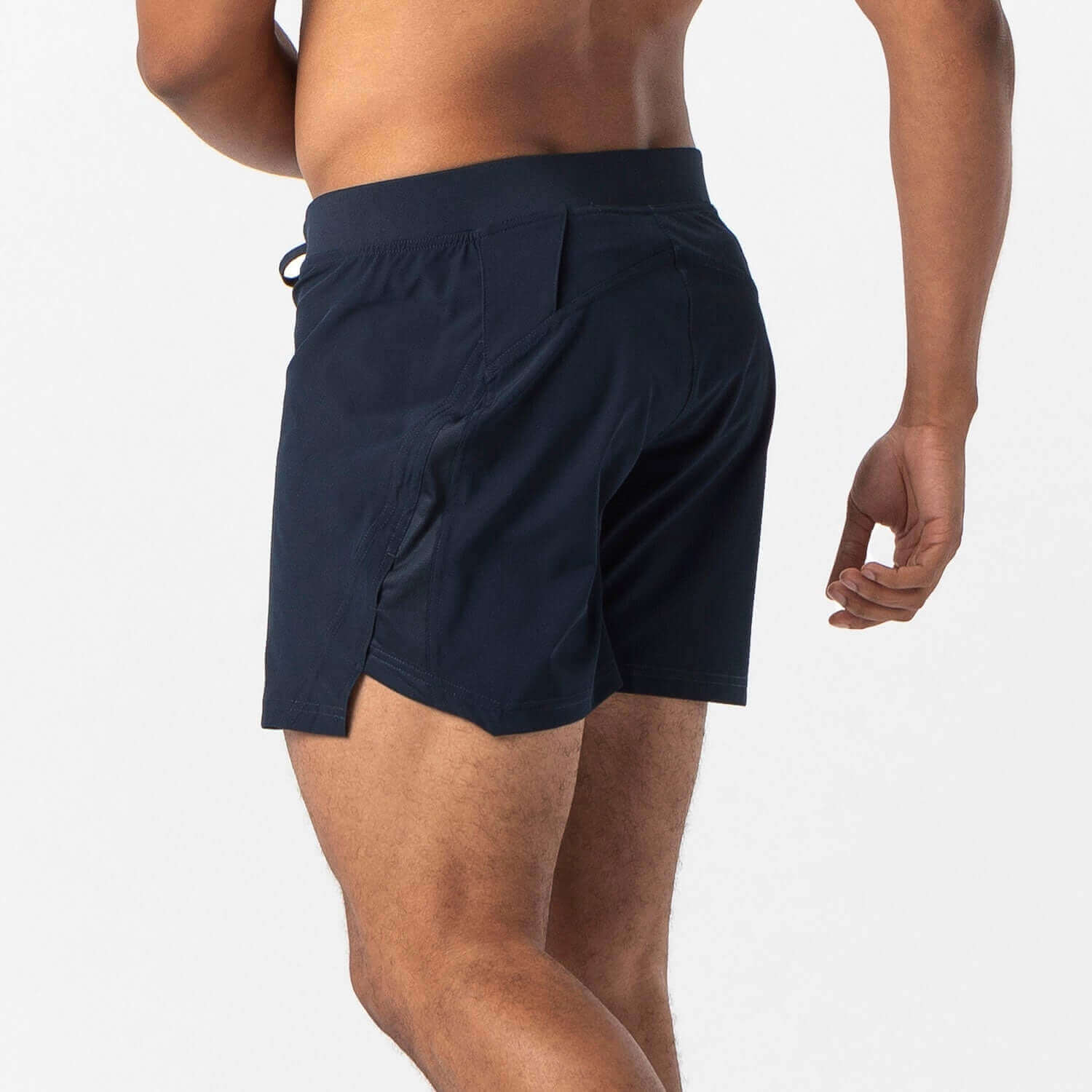 Man wearing Incline Lined Short in navy, showcasing the back design and breathable features for workouts.