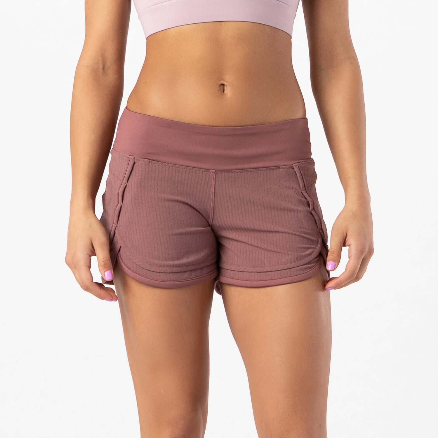 Mauve brown Iris lined shorts featuring a Flex-Knit waistband, breathable mesh liner, and two pockets for comfort during workouts.