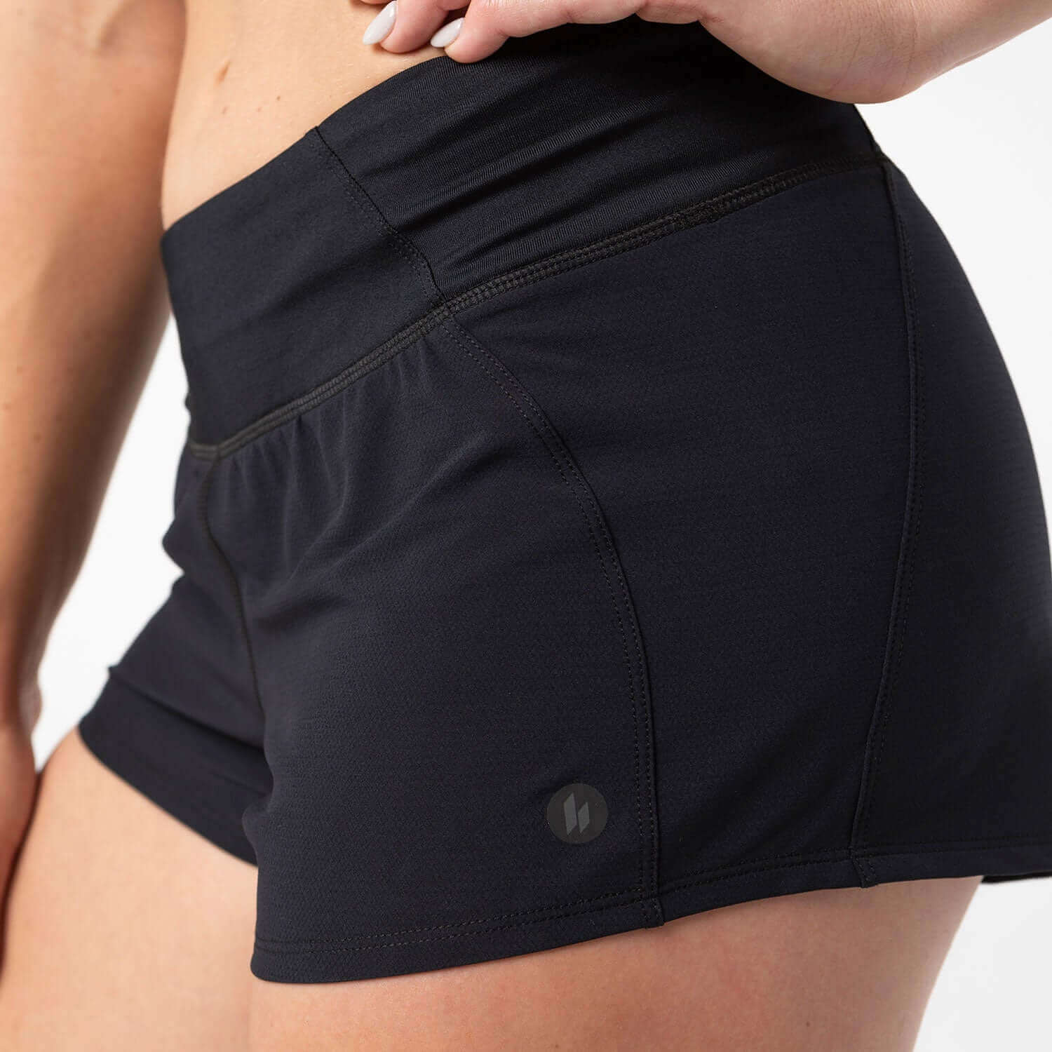 Black athletic shorts with smooth-stretch waistband and built-in liner, ideal for runners and HIIT workouts.