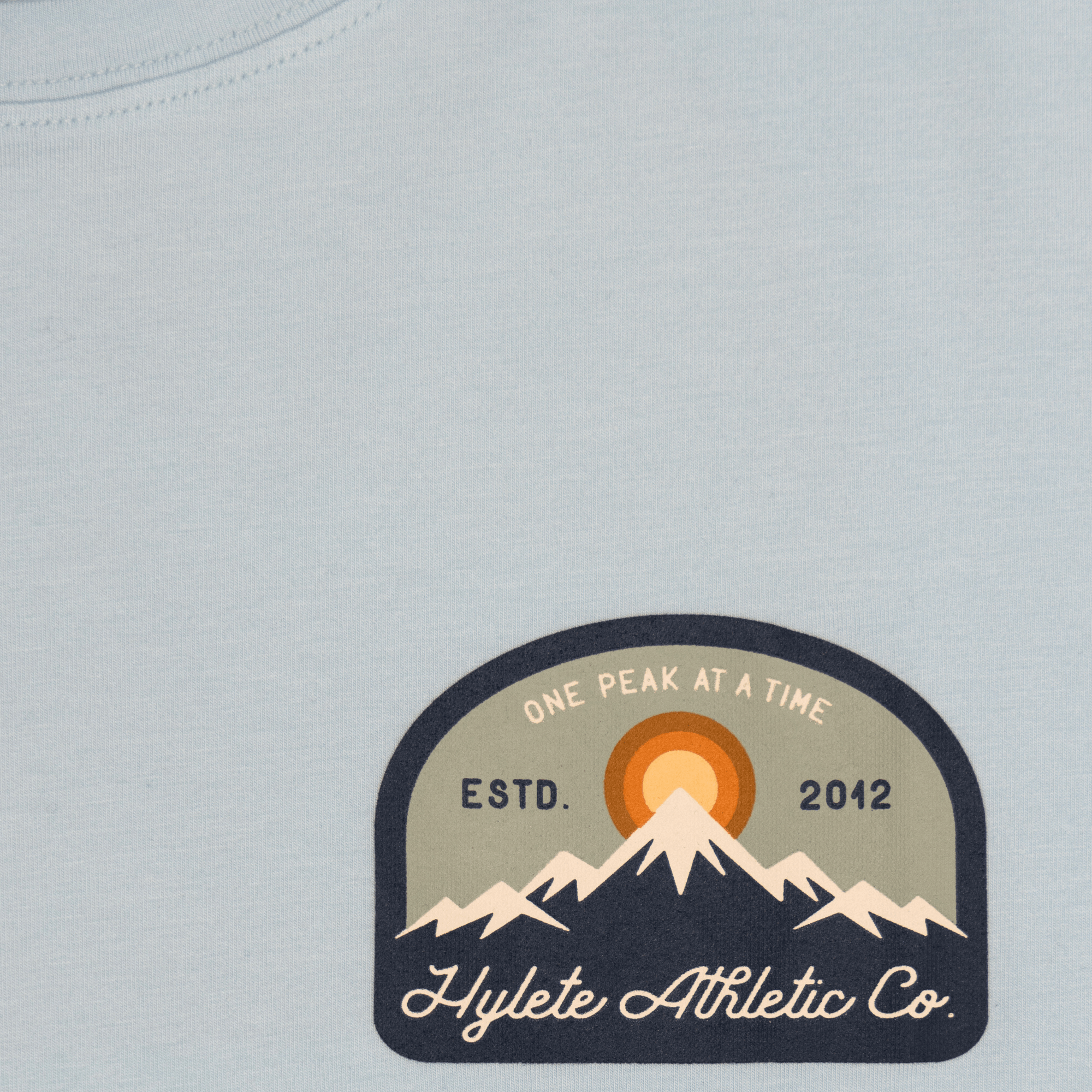 Sky Blue HY-Blend Crew Tee with mountain logo by Hylete Athletic Co, emphasizing high performance and ultimate recovery.