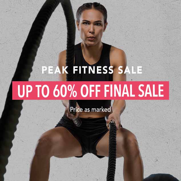 A woman in a black workout top and shorts is holding a battle rope and staring intensely at the camera. Overlaying the image are the words 