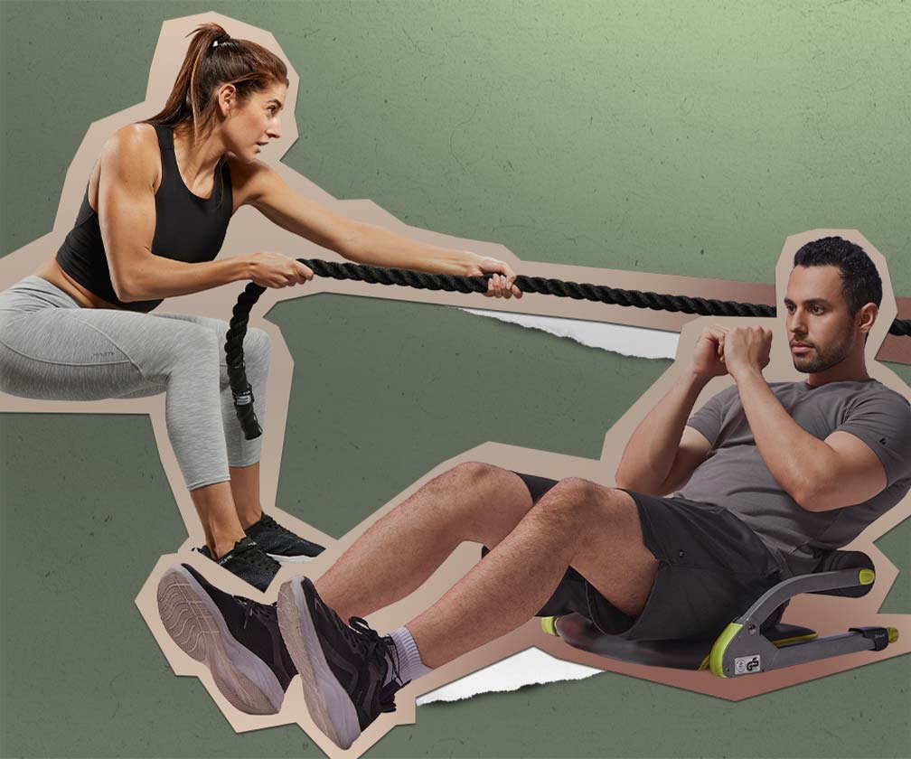 A man using an abdominal workout machine and a woman doing a workout with a rope.
