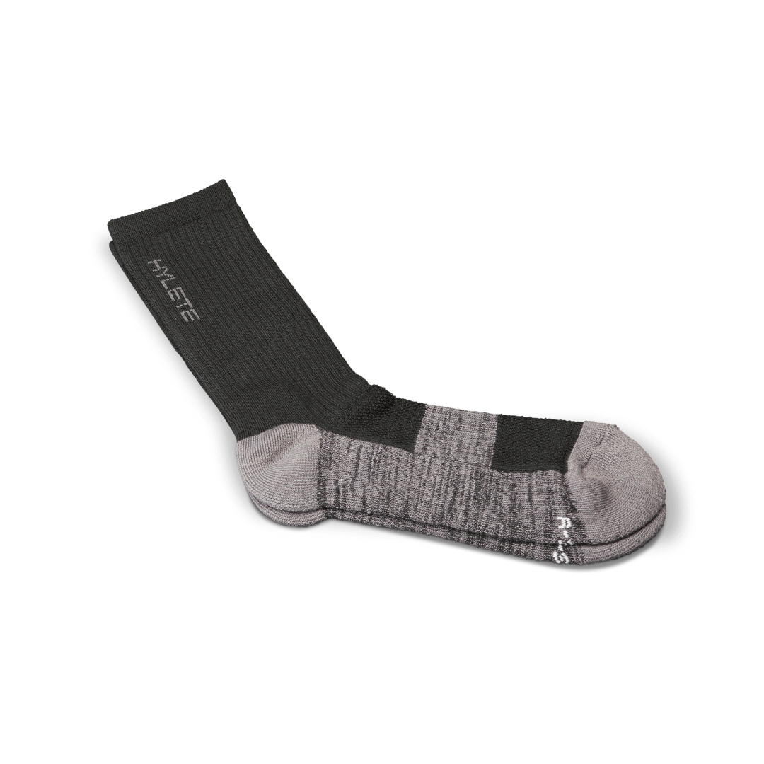 Midweight crew sock in black and cool gray, offering comfort, breathability, and moisture-wicking for training.