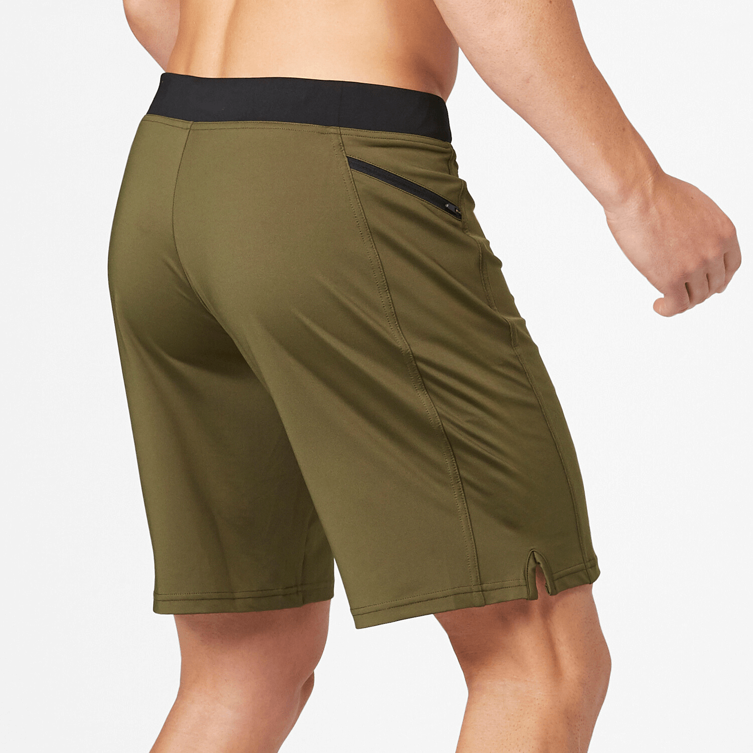 Man wearing Vertex II Short in olive, showcasing flex-knit fabric, ideal for workouts and outdoor activities.