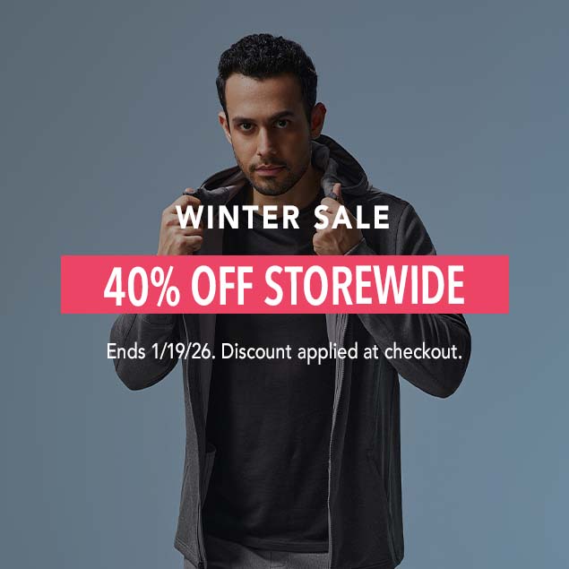 A man in a Hylete Flexion II Jacket in grey and a HY-Blend Crew Tee in black pulls up his hood, framed by a banner that reads "WINTER SALE 40% OFF STOREWIDE. Ends 1/19/26. Discount applied at checkout."