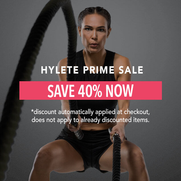 Focused female athlete in black HYLETE workout gear using battle ropes, promoting HYLETE Prime Sale with “Save 40% Now” banner.